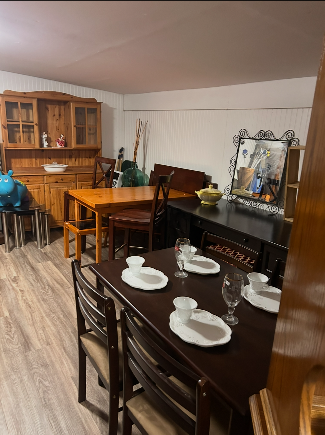 Assorted used tables and lamps